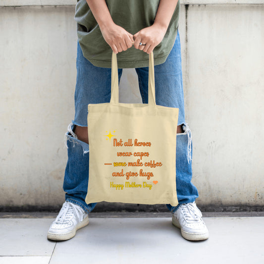 Not all heroes wear capes; some make coffee and give hugs. Happy Mother's Day. (Tote Bag)